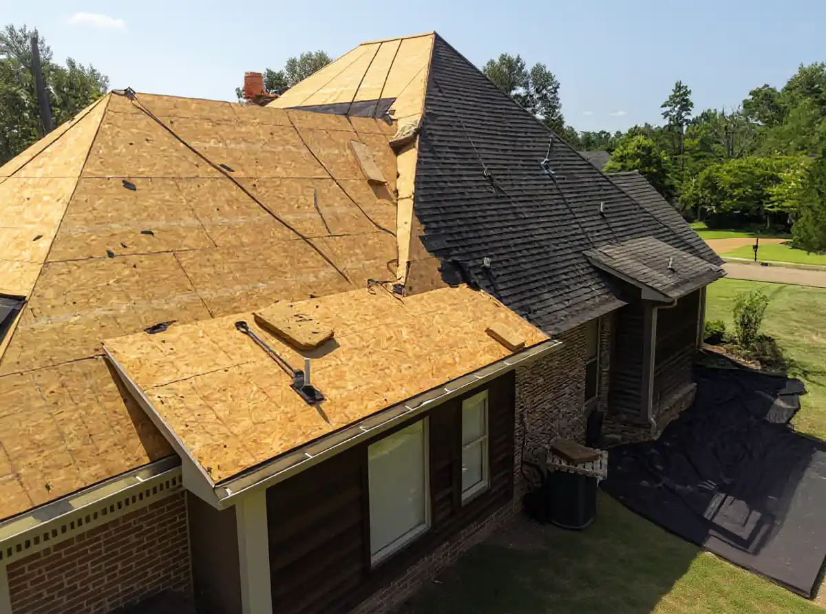 Roofing crew installing new shingles in Kanwaka, Kansas