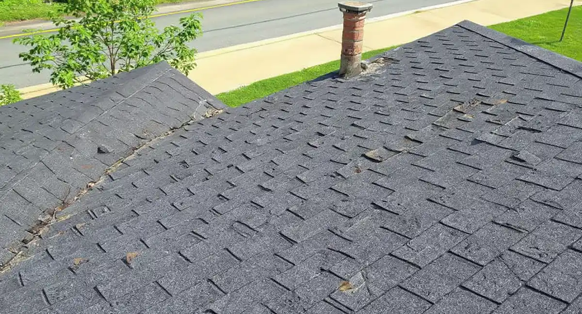 Storm damage on residential roof in Kanwaka, Kansas