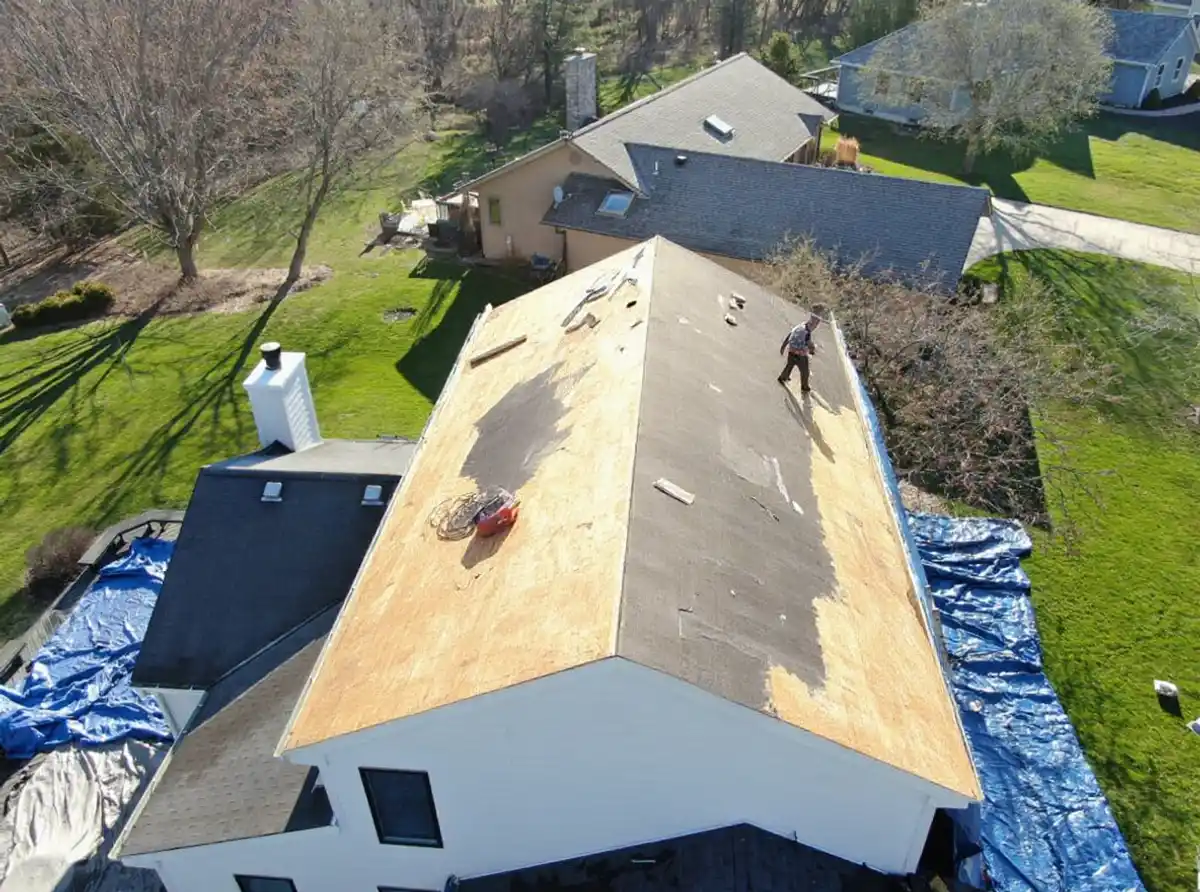 Roof tear-off in progress on home in Sibleyville, Kansas